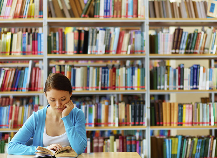 girl studying library