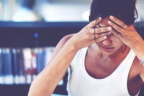 woman studying upset